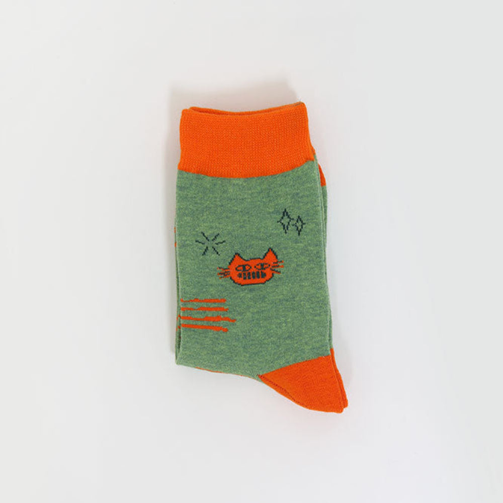 A single folded sock on a plain white background, featuring a heather green body with bright orange cuffs, toe, and heel, and a small orange cat graphic with the text 'Tiger Plans'.