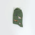 An olive green sock with embroidered woodland animals including a fox, mouse, duck, and cat, shown on a plain white background.