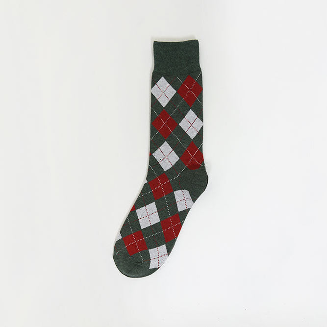 A pair of knit socks with a light pink ribbed cuff and a green and white vertically striped body, featuring the text 'ME,HI' embroidered on one cuff.