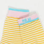 Yellow and white striped knit pet shorts with a pink waistband and light blue trim, featuring the text 'ME, HI' on the front.