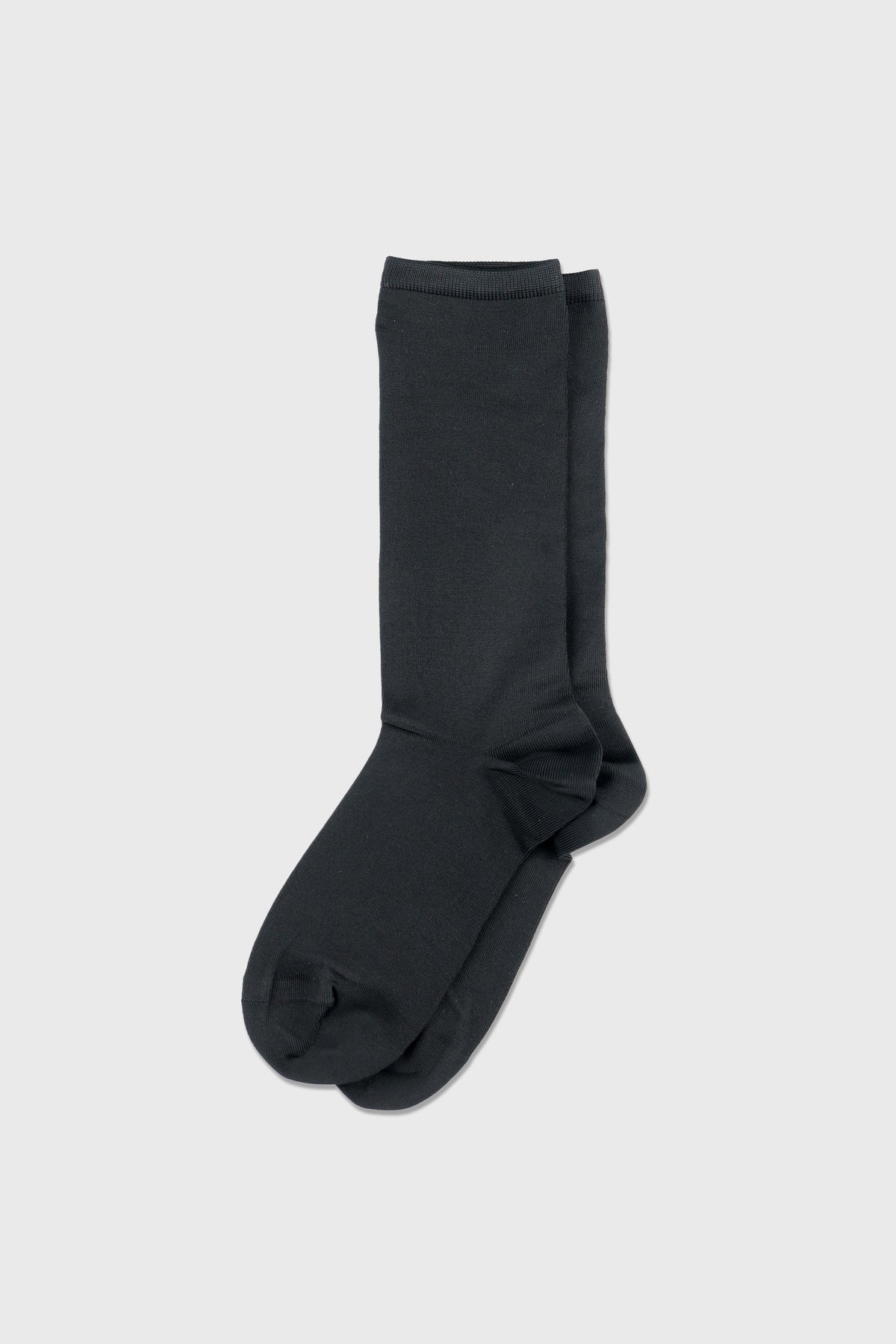 A pair of dark charcoal gray crew socks displayed flat against a light gray background.