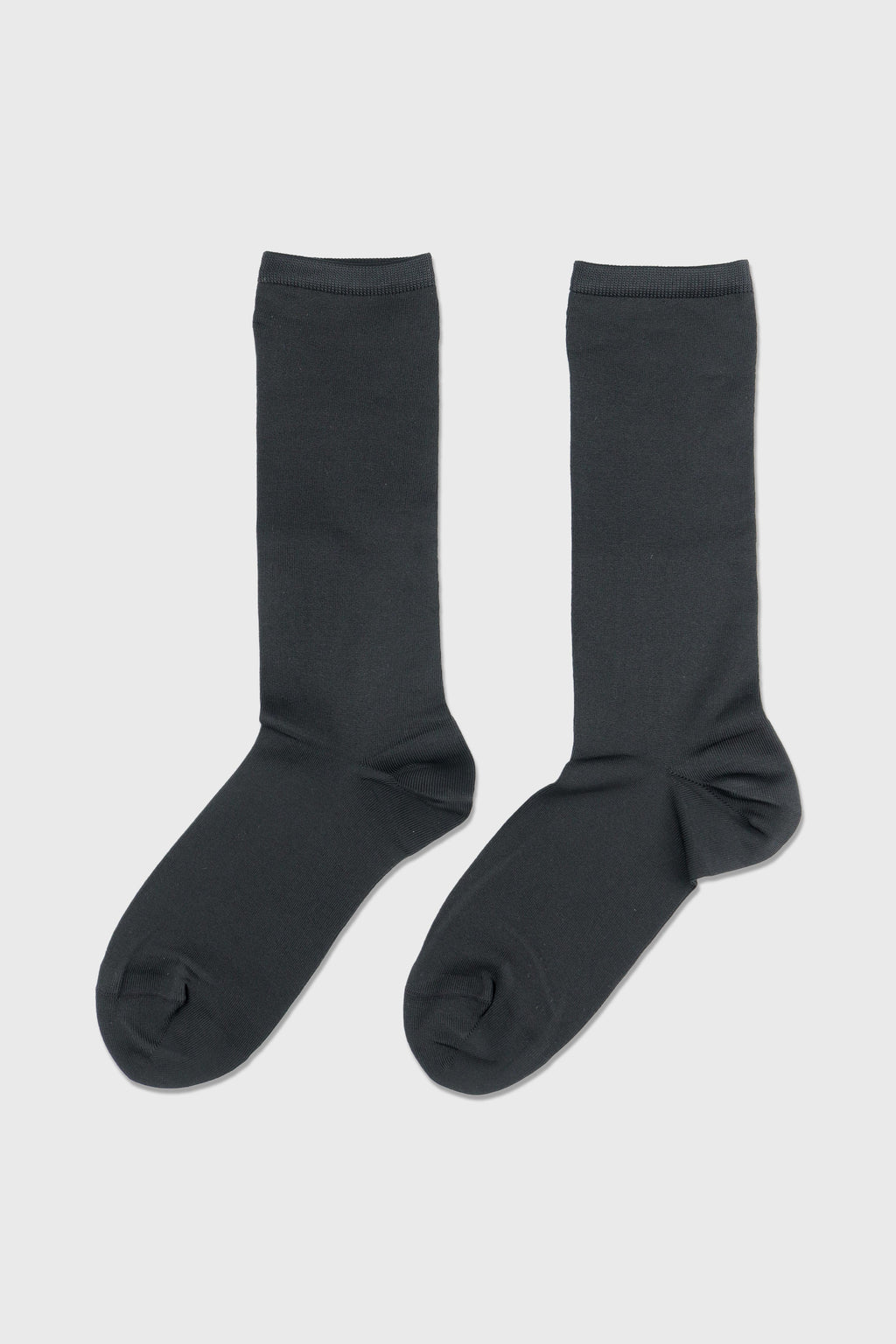 A pair of dark charcoal gray crew socks displayed flat against a light gray background.