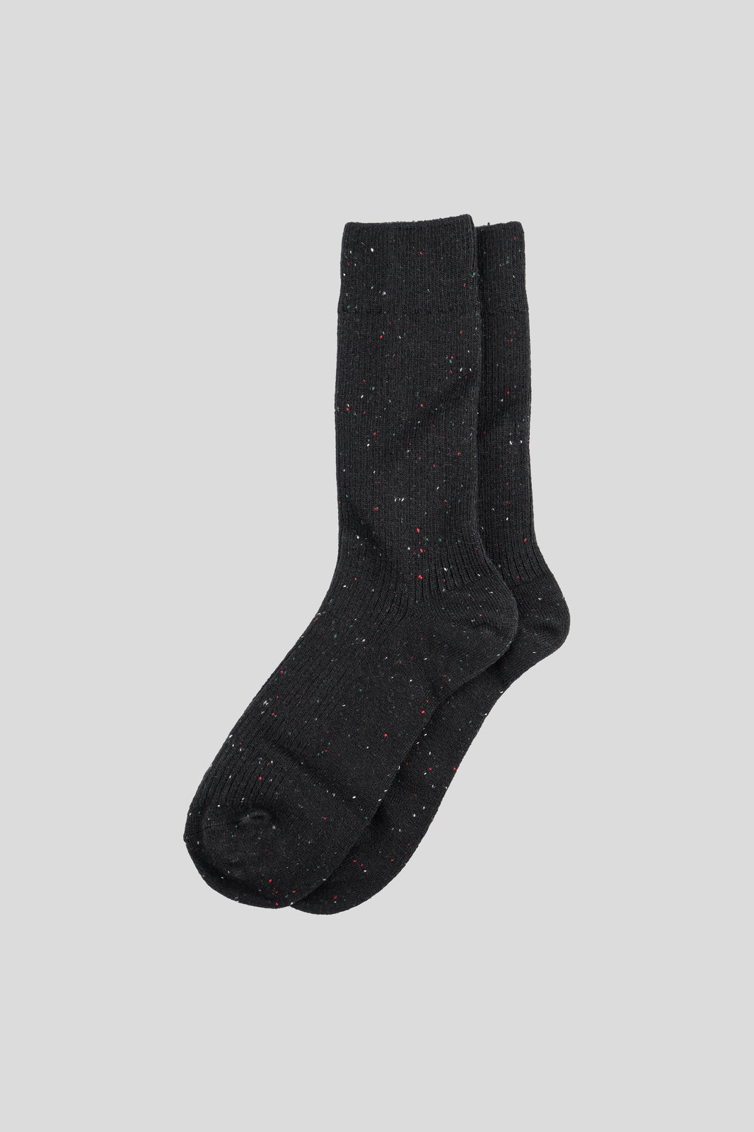 Green sock with a brand logo on a white background