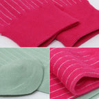 Three close-up views of knit socks or sock-like fabric pieces: a bright pink pair at the top, a mint green pair at the bottom left, and a pink pair with thin white pinstripes at the bottom right. The fabric fills most of the frame against a white background.