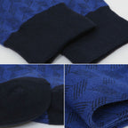 A close-up collage showing a knit sock or fabric product in two main colors: a royal blue section with a dark tonal geometric pattern and a solid black ribbed cuff. The collage includes three panels demonstrating different close-up views of the texture and construction.