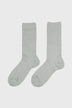 A pair of light gray crew socks displayed flat against a light gray background.