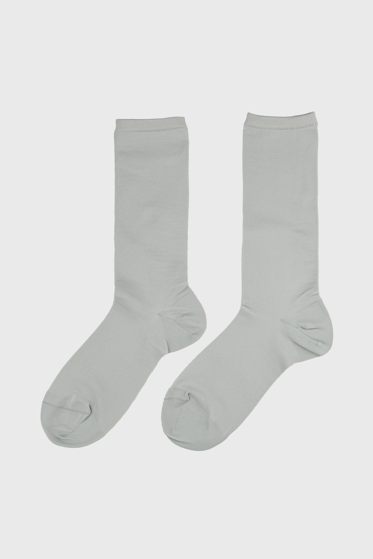 A pair of light gray crew socks displayed flat against a light gray background.