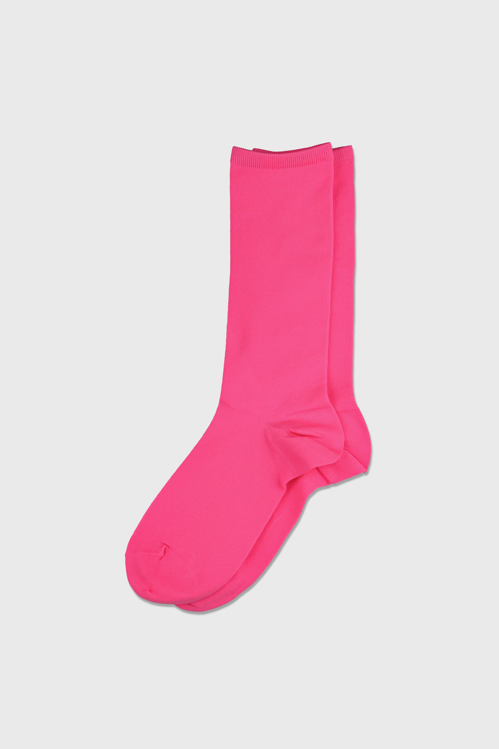 A single bright pink crew sock displayed flat against a light gray background.
