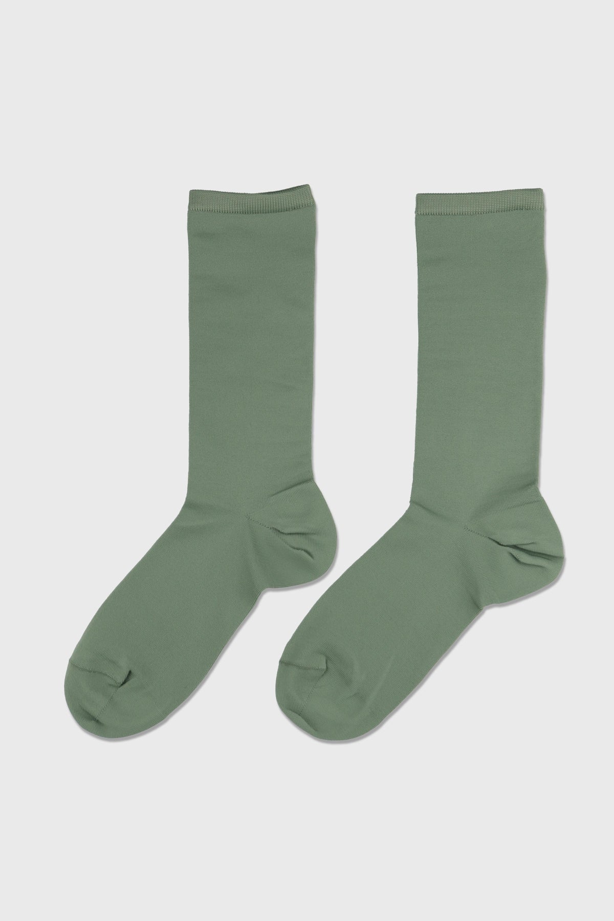 Women's Ultra-Lightweight Breathable Crew Socks-Cooling Performance Olive-A pair of solid sage green crew socks displayed flat against a light gray background.