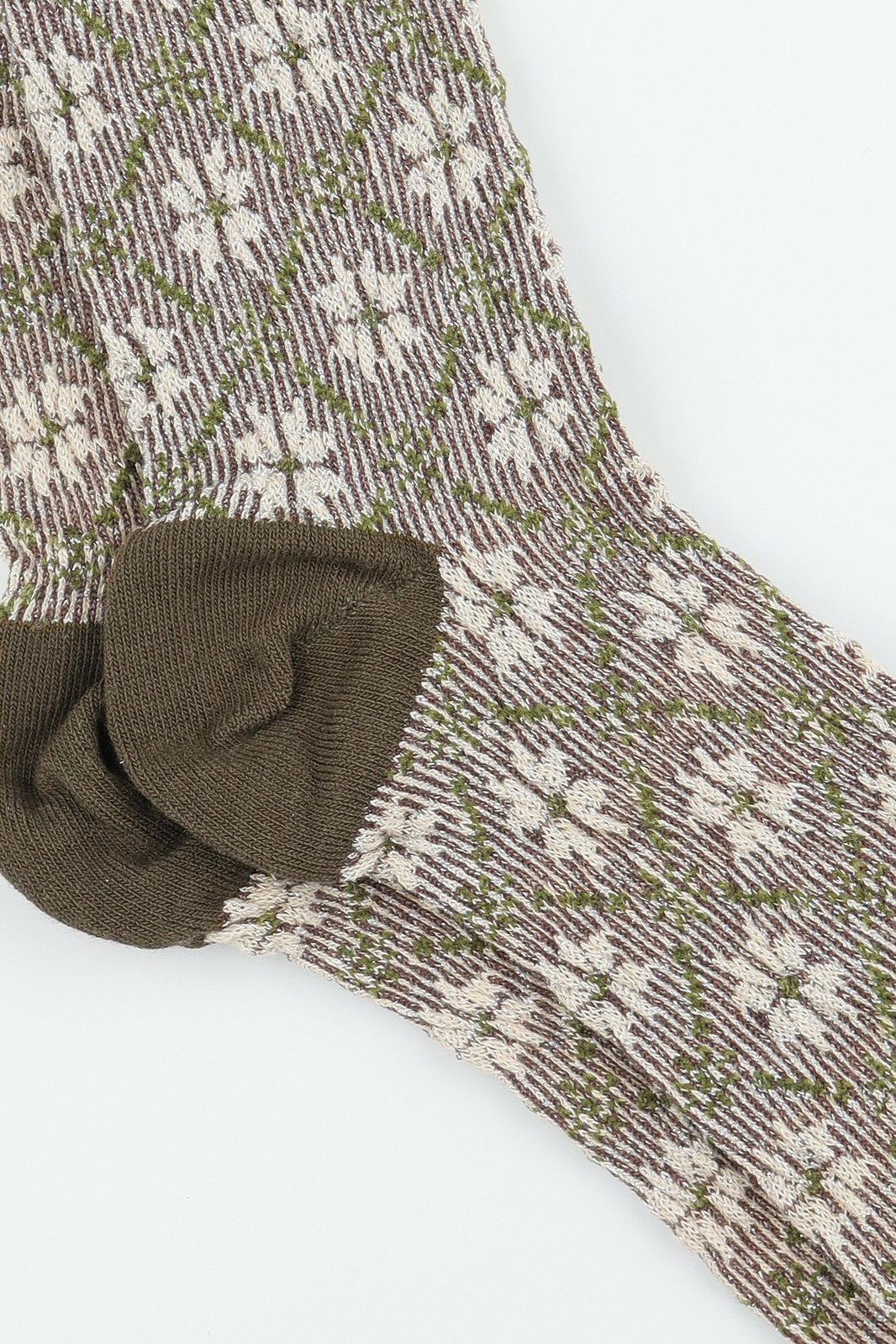 Women's Premium Combed Cotton Metallic Sparkle Crew Socks-A close-up of a single knit sock with a brown and cream floral pattern with Metallic thread and an olive green heel, shown on a plain white background.