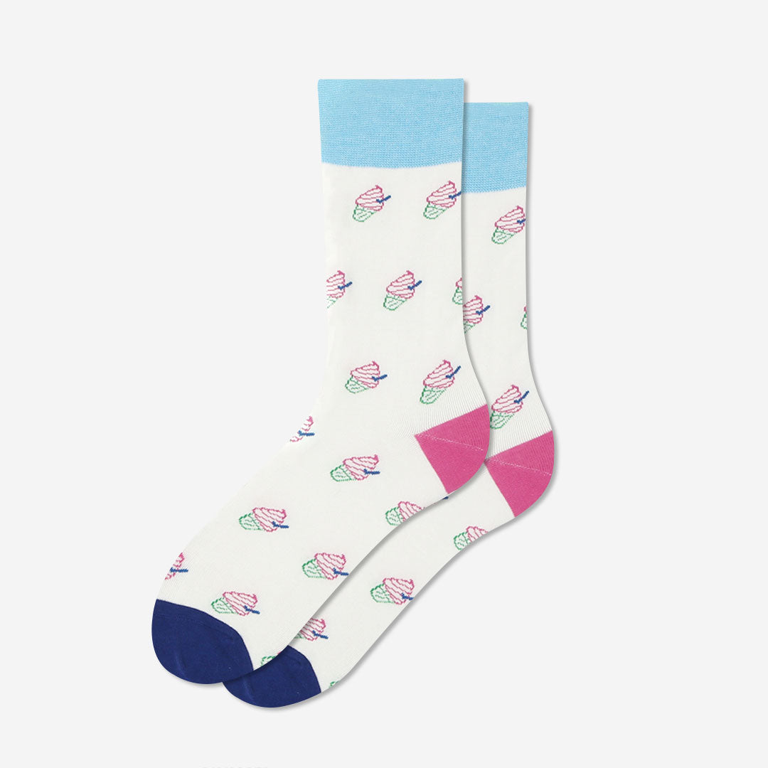 A pair of white crew socks with a repeating pattern of pink and green ice cream cones, featuring a light blue cuff, a pink heel, and a navy blue toe.